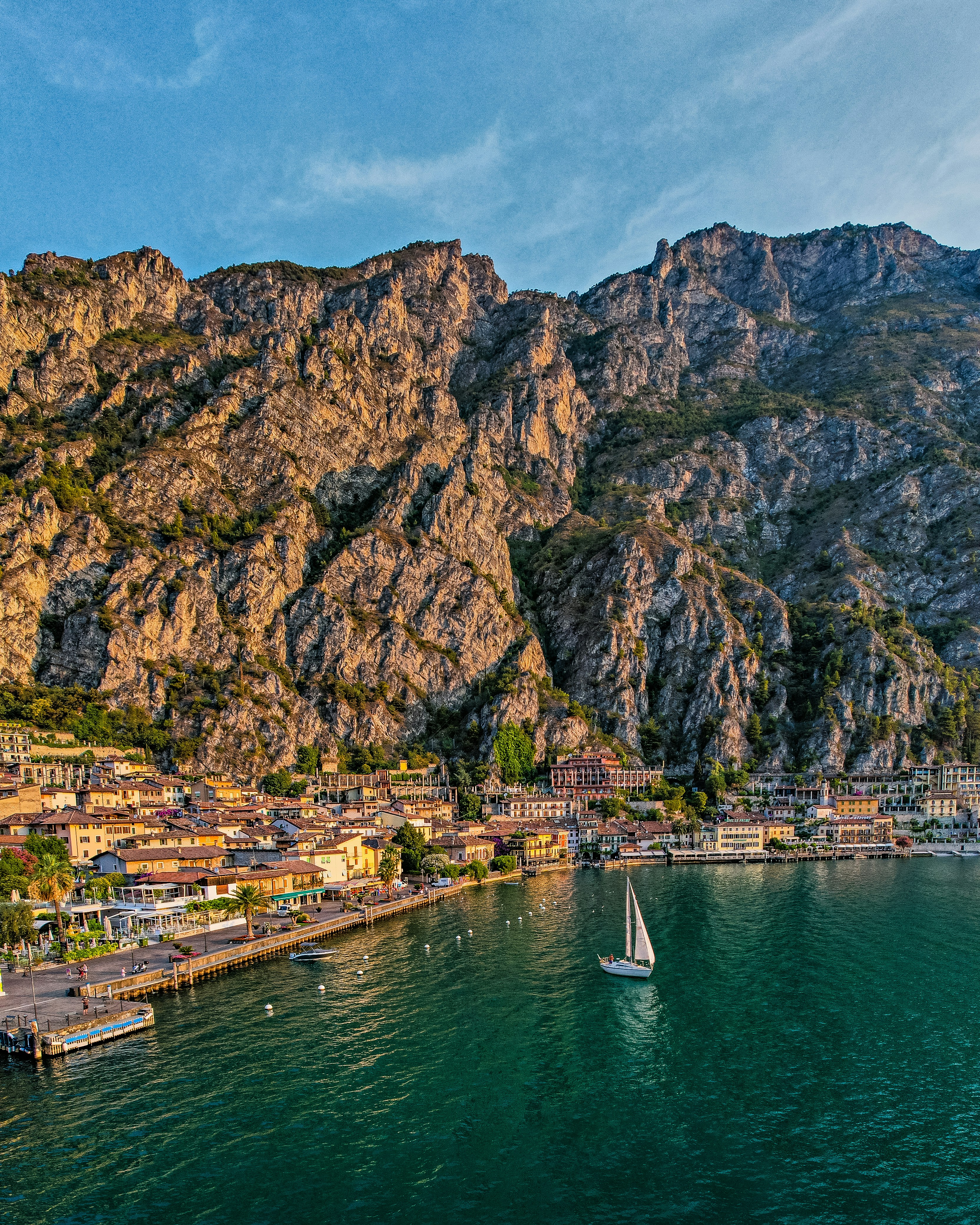 a body of water with a mountain in the background