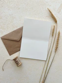 An open envelope revealing a recipe card with a warm, rustic design and a playlist note tucked inside.