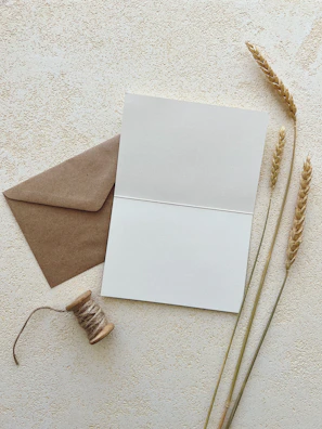 An open envelope revealing a recipe card with a warm, rustic design and a playlist note tucked inside.