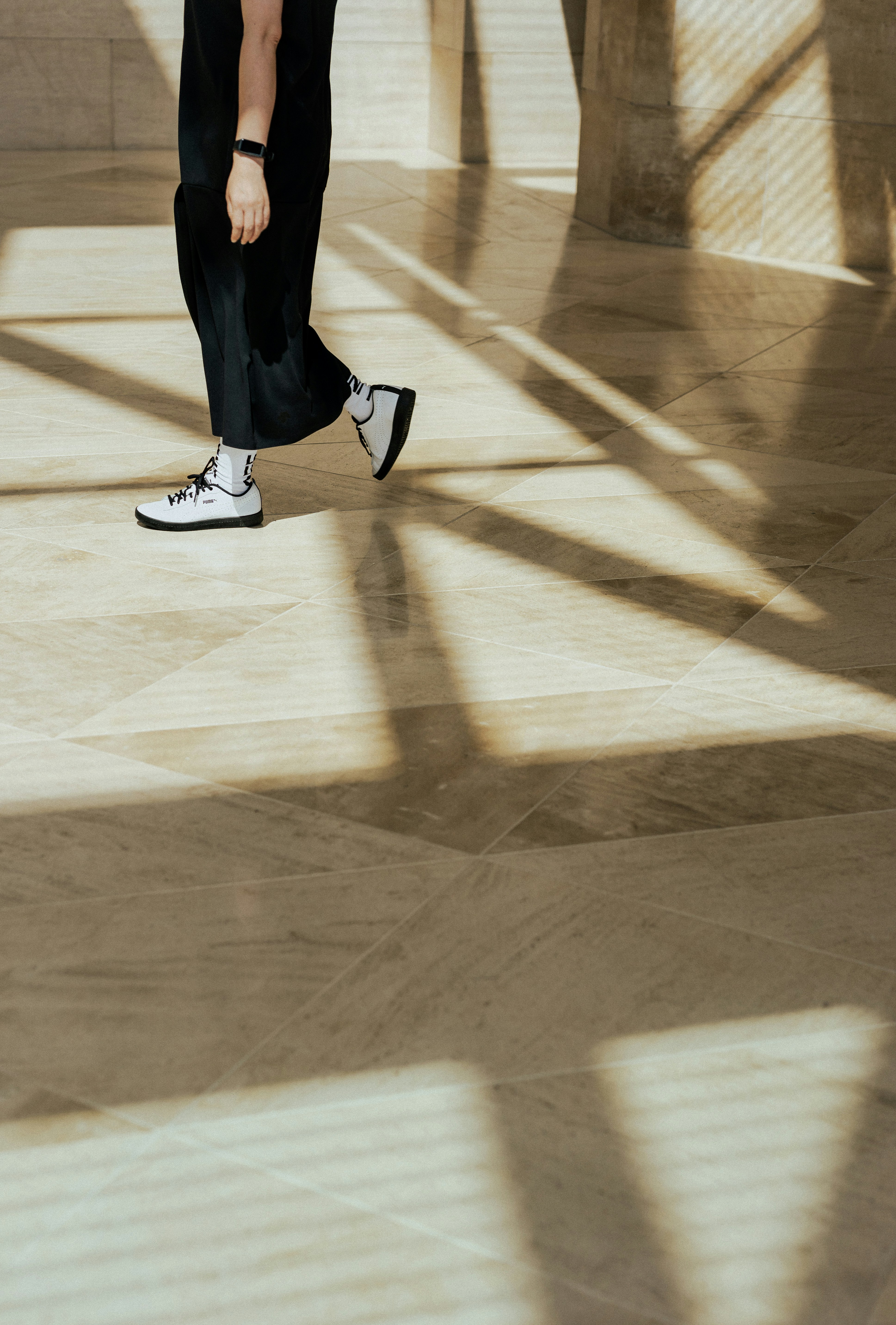 a person's legs and shoes