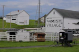a white building with a sign on it