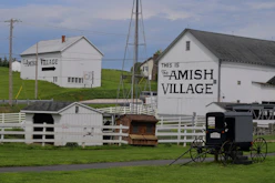 a white building with a sign on it
