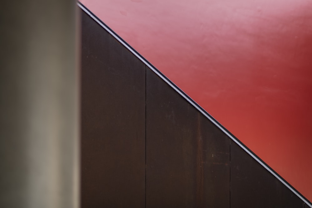 a red wall with a black border