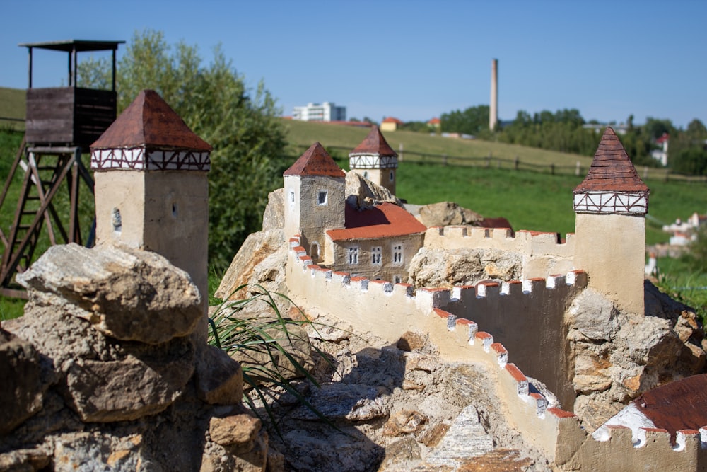 a group of buildings with red roofs