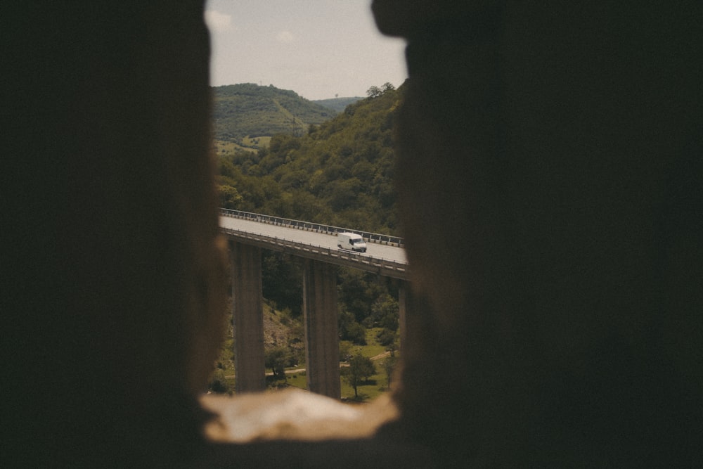 a train going by a bridge