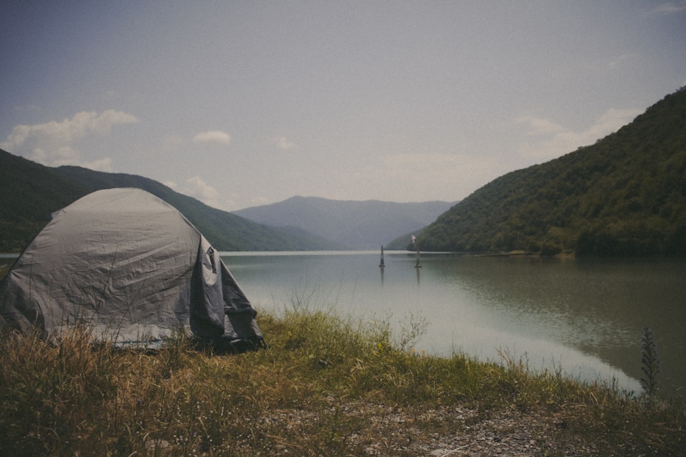 a tent on a lake