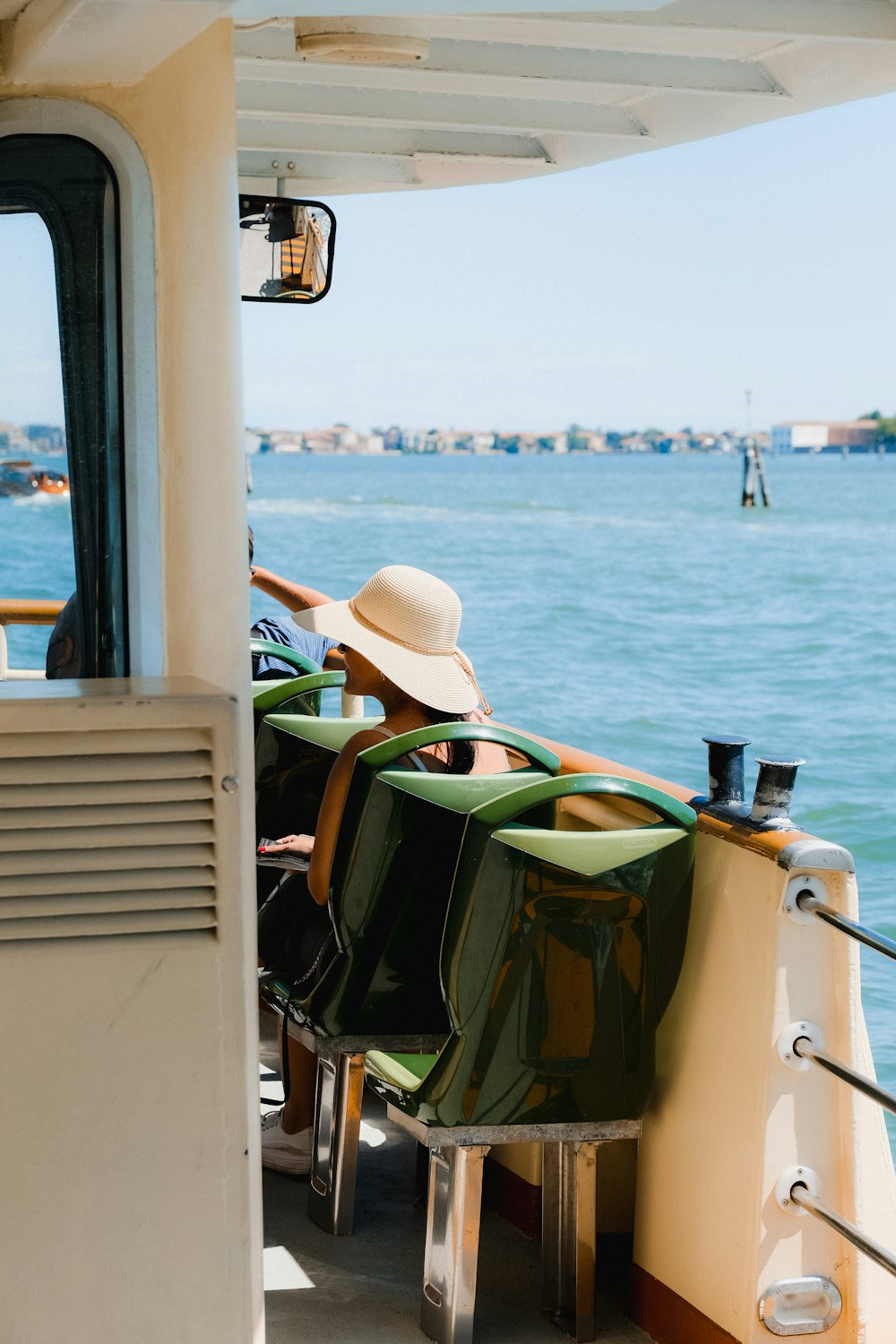 a person sitting in a chair on a boat