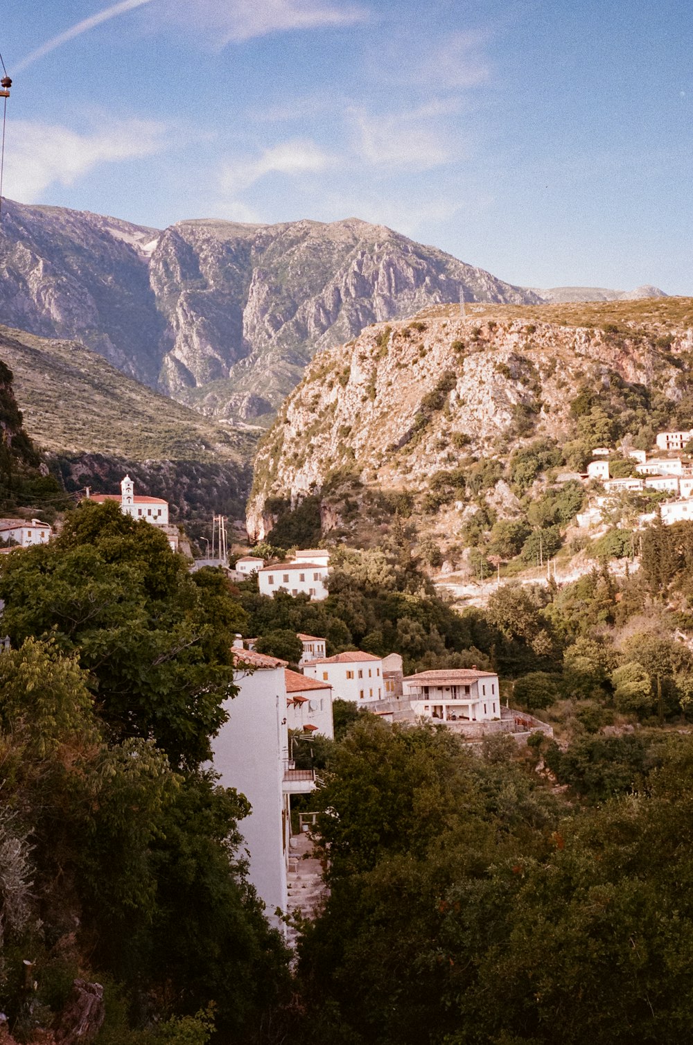 a group of buildings on a hill