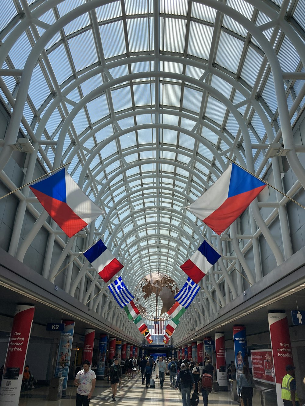 a large building with many flags