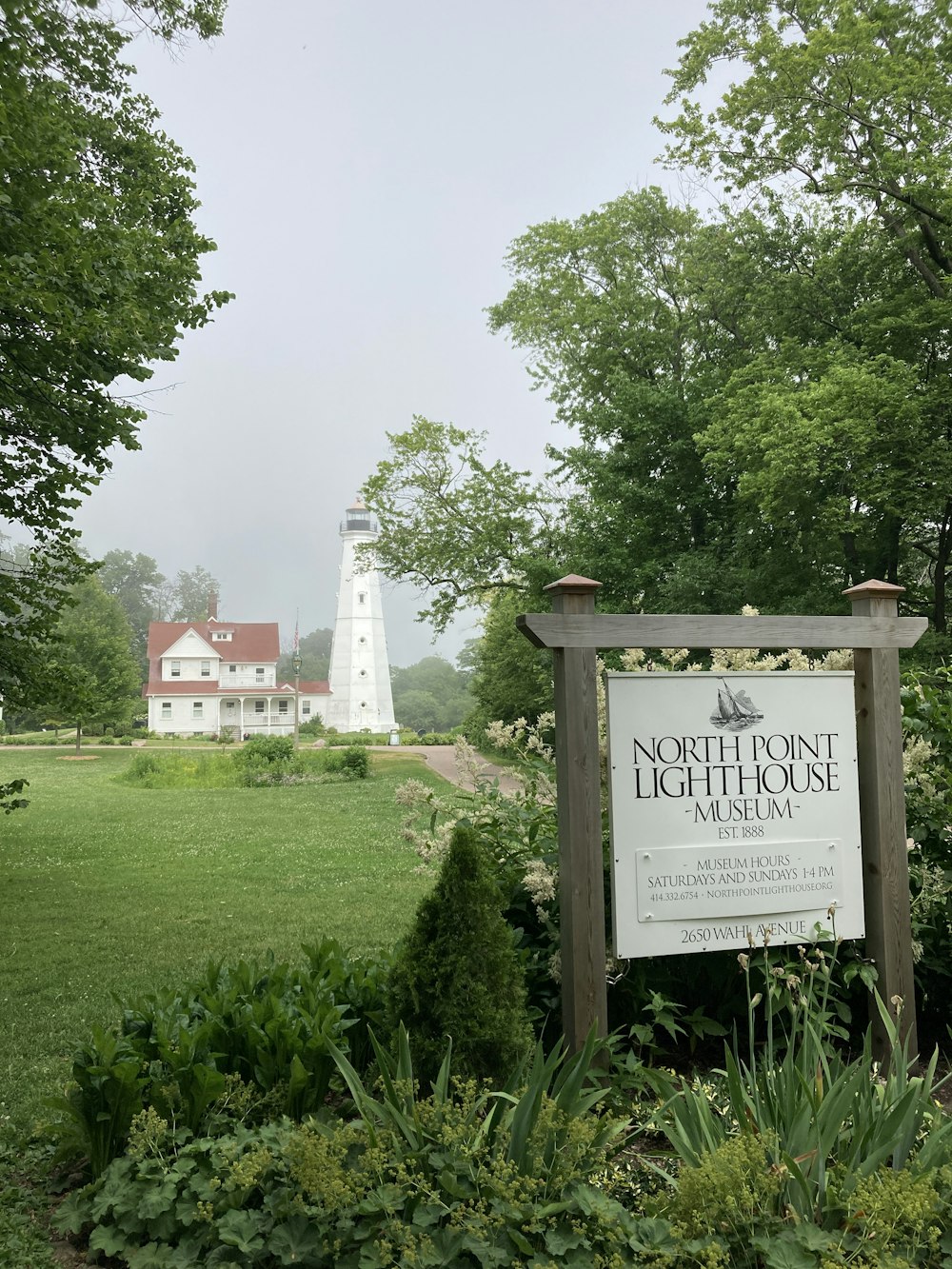 a sign in a garden