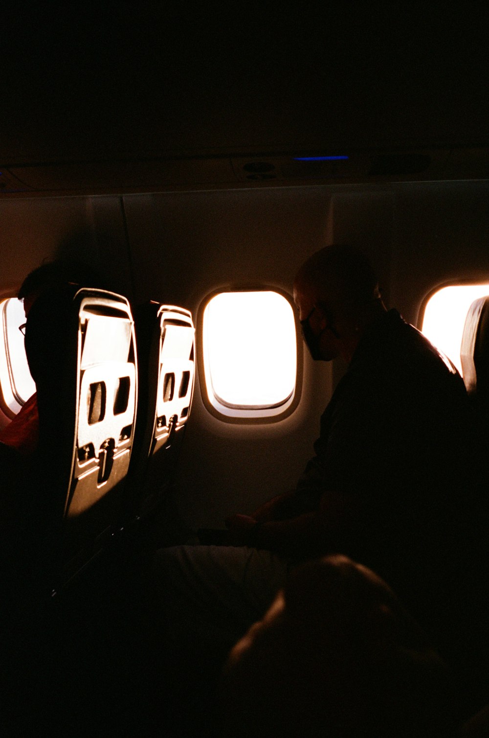 a person sitting in a plane