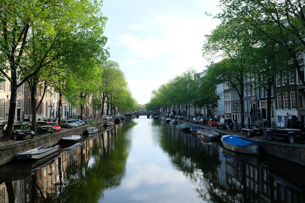 a canal with boats on it with Canal Saint-Martin in the background