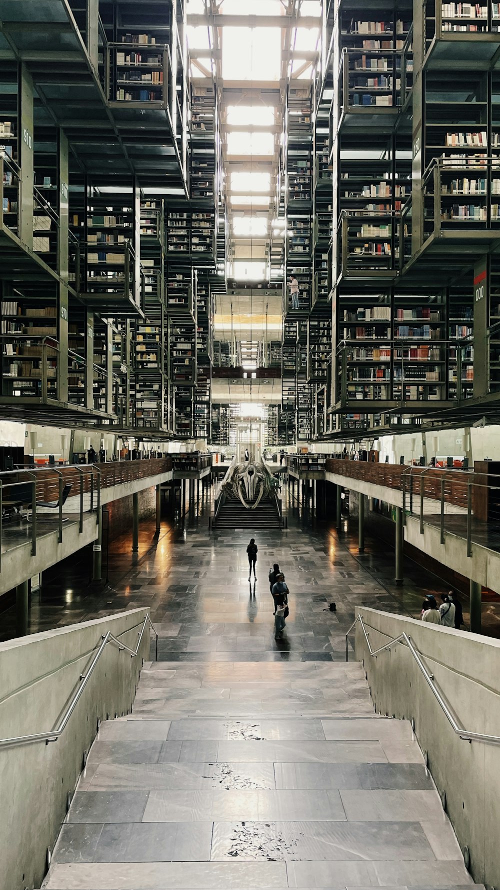 a large library with many bookshelves