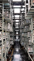 a long hallway with many bookshelves
