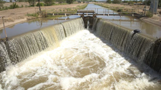 a dam with water flowing over it