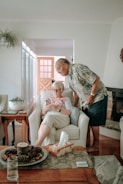 a woman and a man in a living room