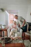 a woman and a man in a living room