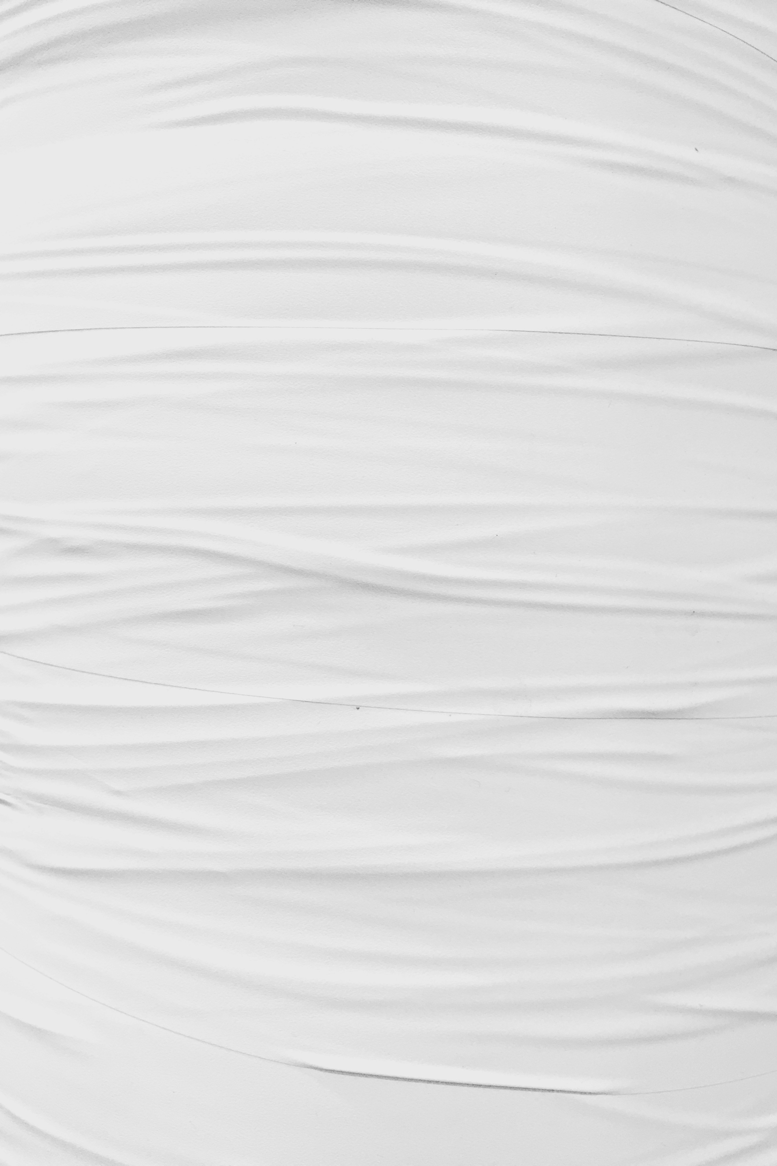 a white surface with cracks