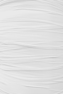 a white surface with cracks