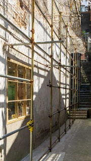 a building with a yellow pole