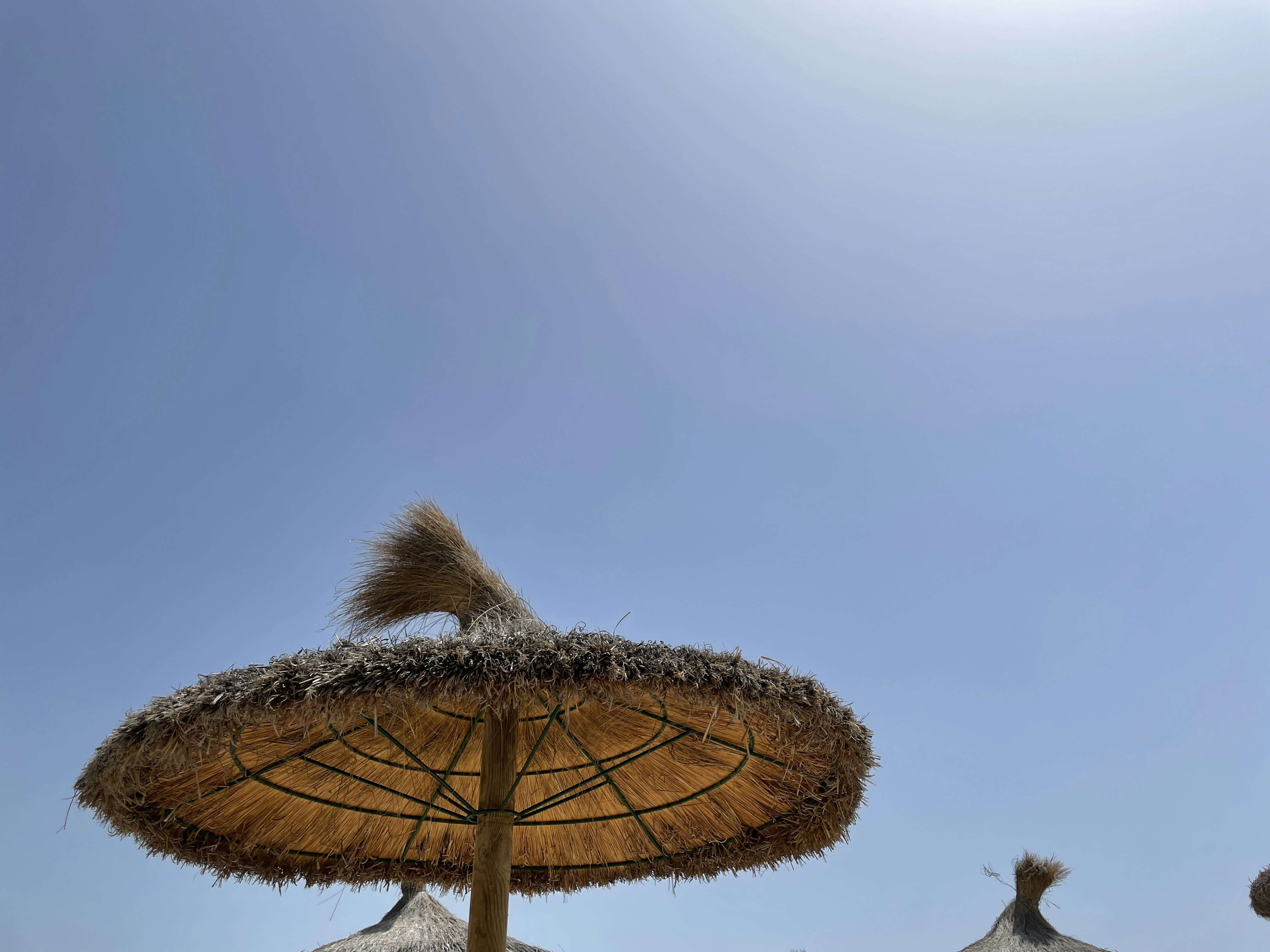 a straw umbrella with a straw