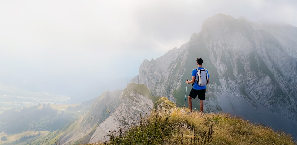 a man hiking on a mountain