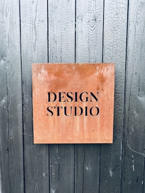 a sign on the side of a wooden door