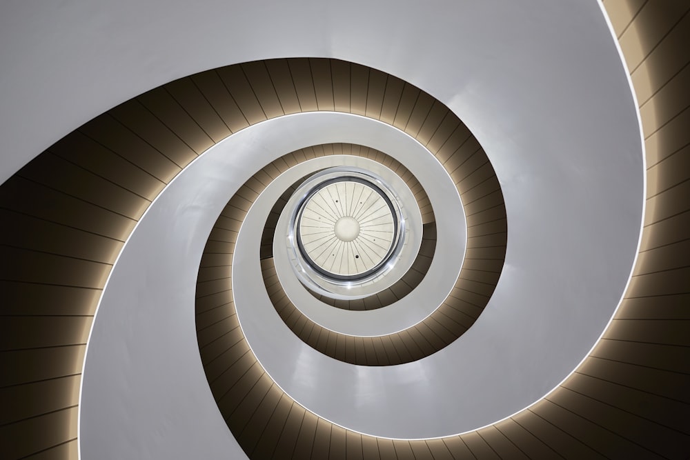 a circular staircase with a circular window