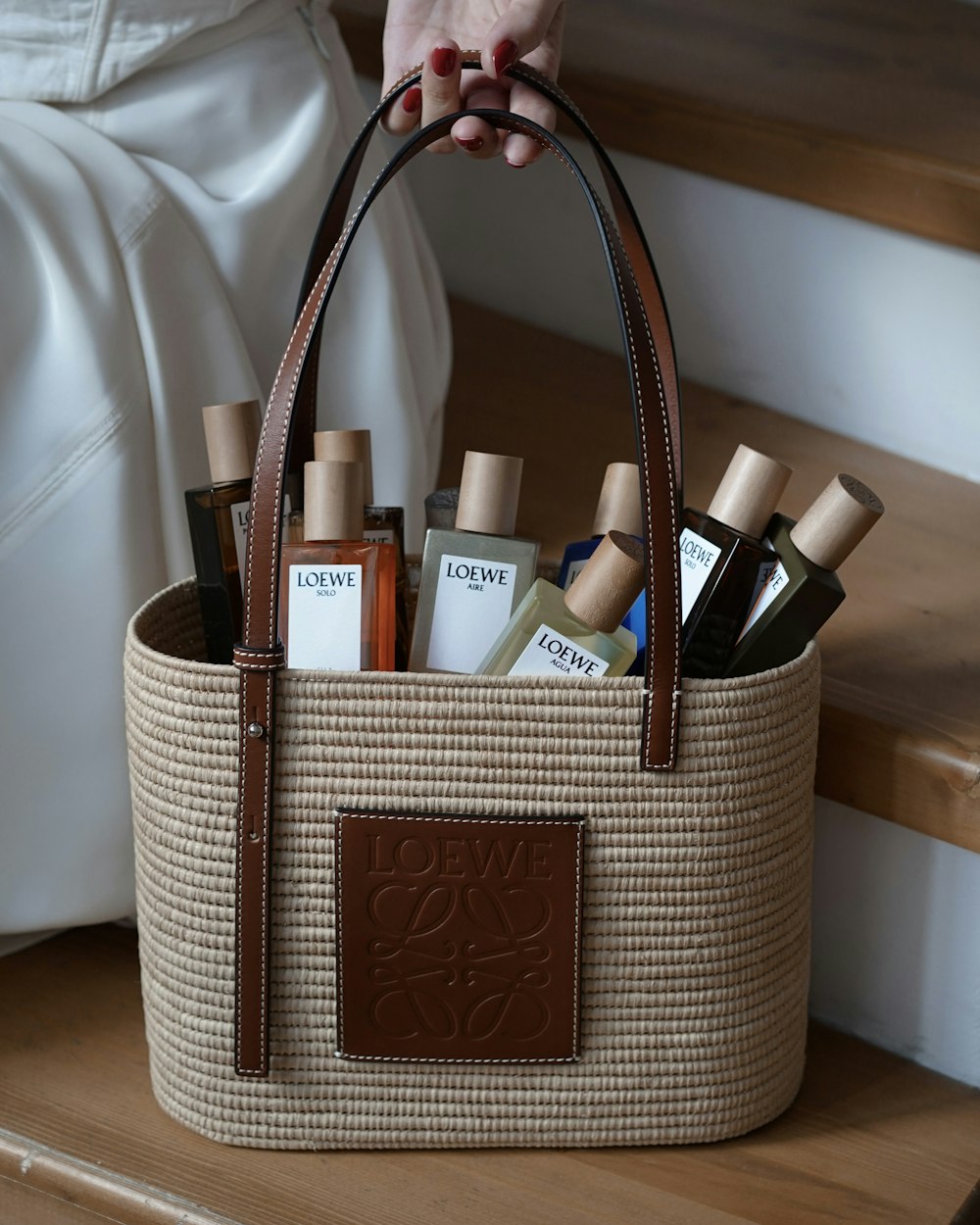 a basket with a toothbrush and other objects in it