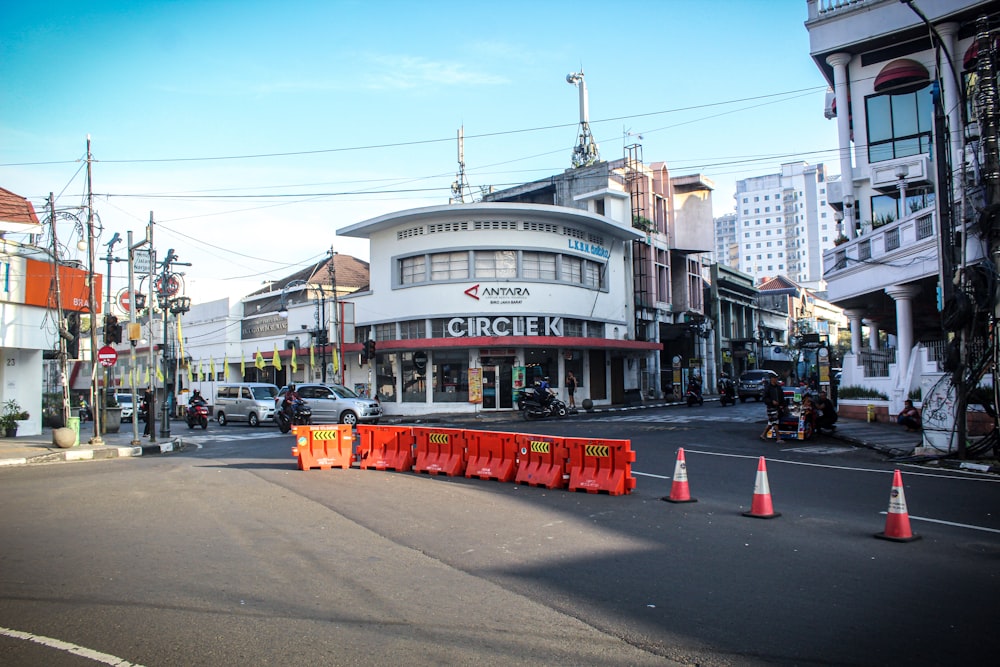 a street with construction cones