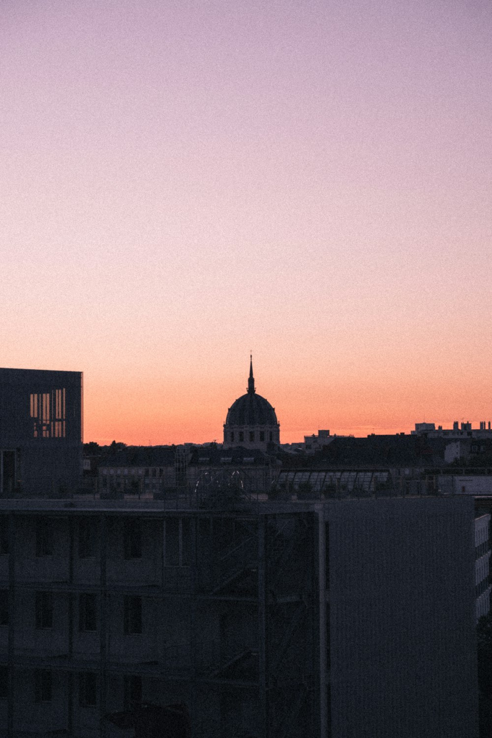 a city skyline at sunset