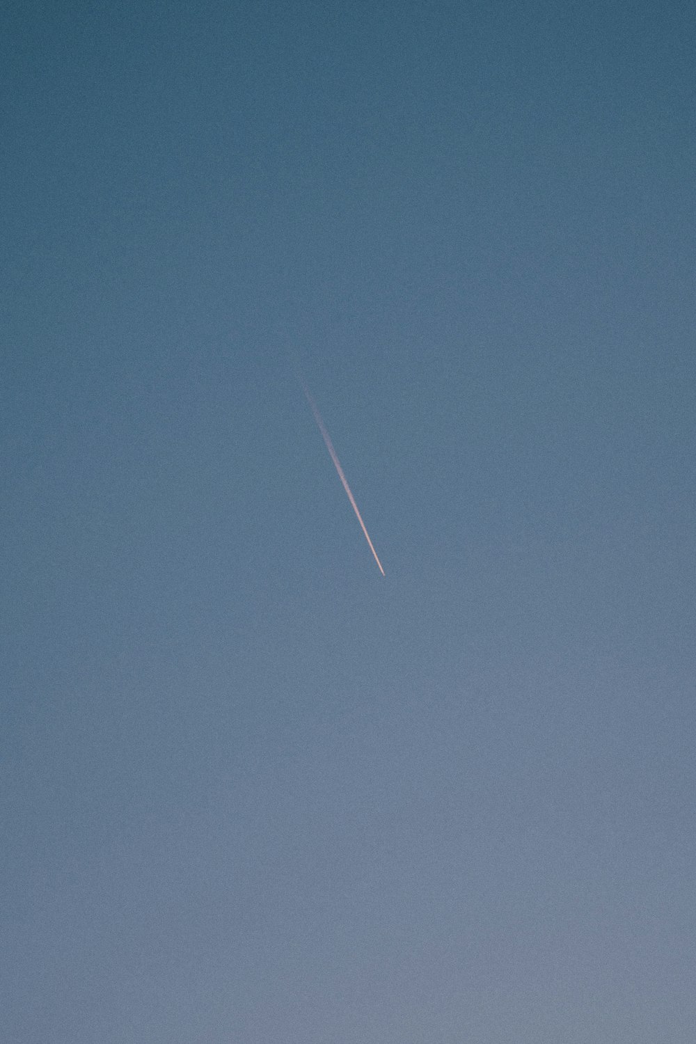 a jet flying in the sky