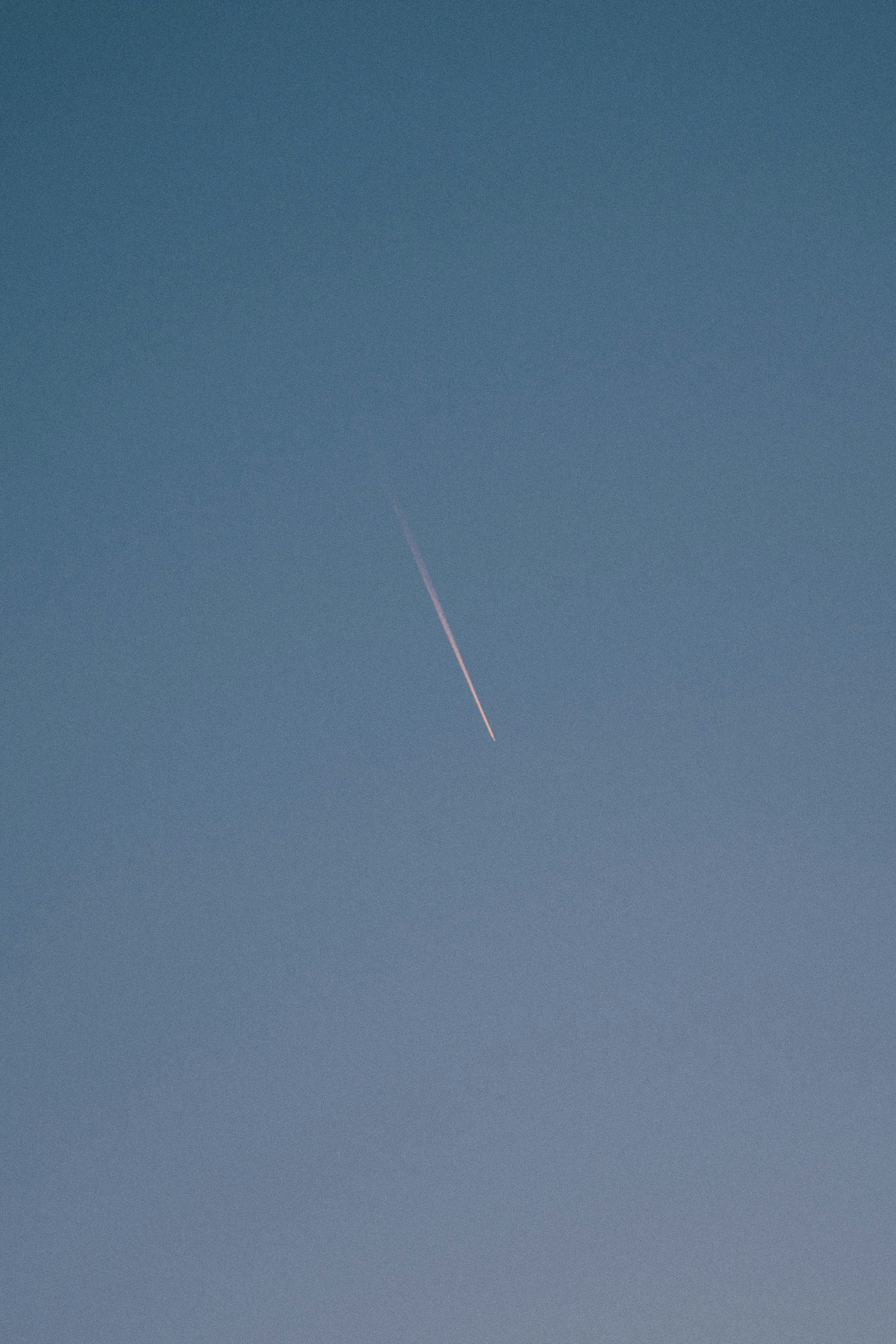 a jet flying in the sky