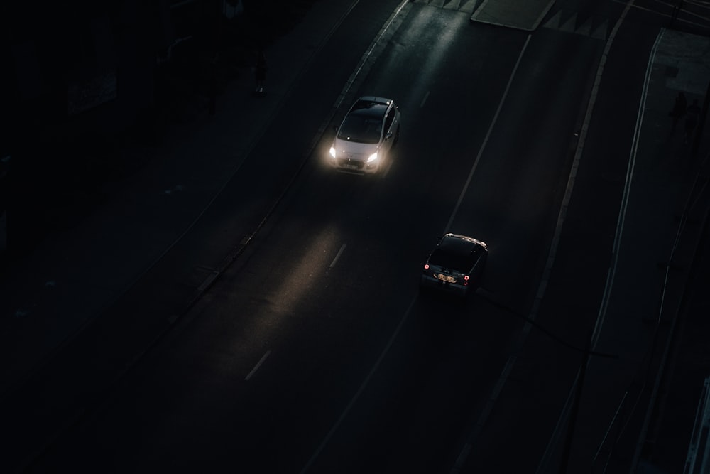 cars on a road at night