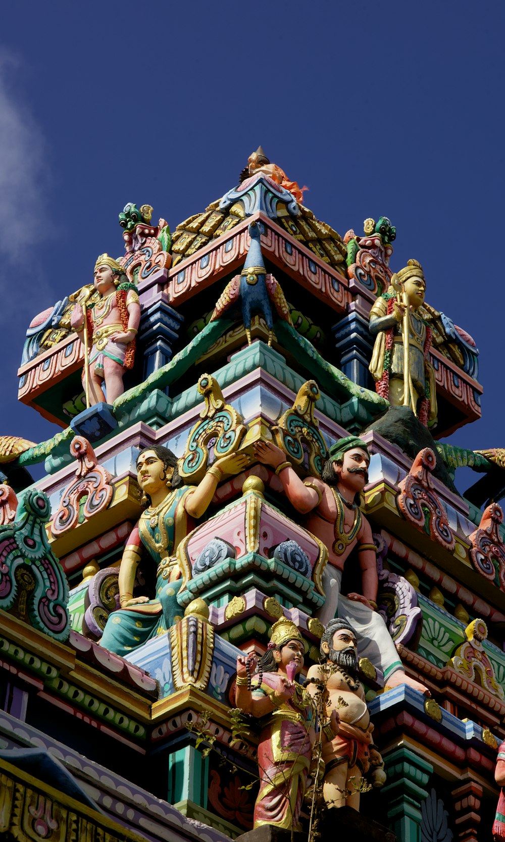 a colorful temple with statues