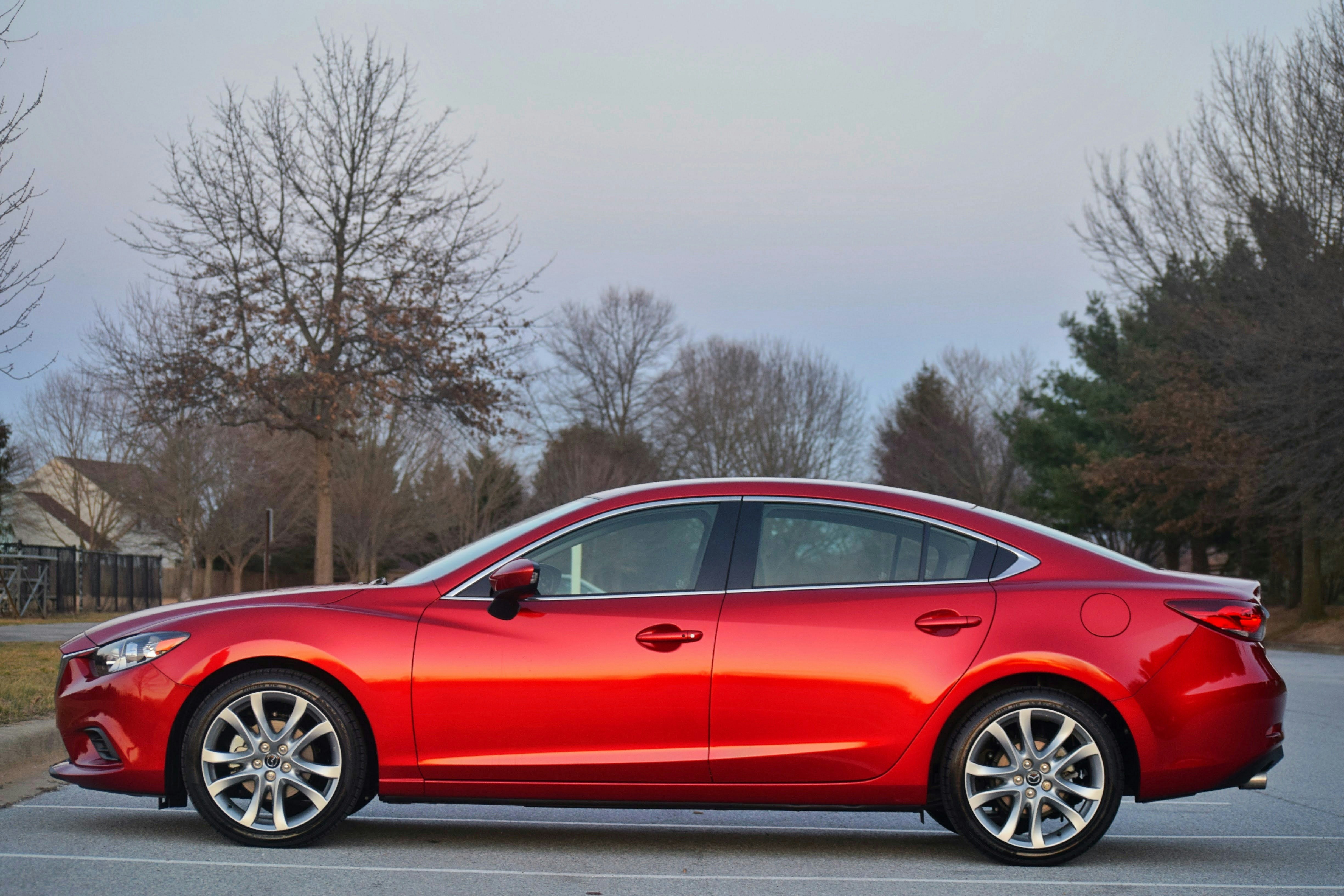 Our first car holds a special place in our hearts. Mazda 6 in soul red.