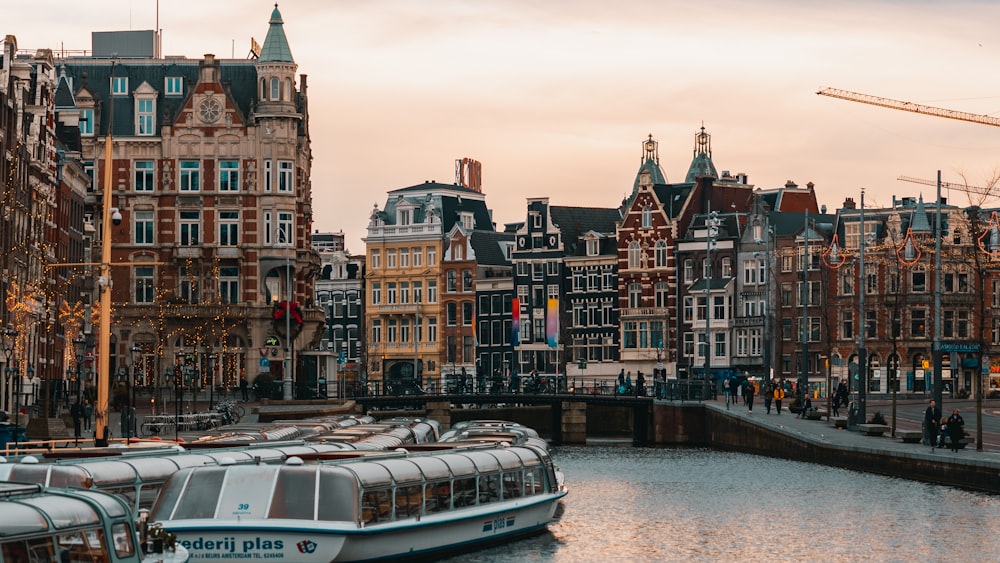 a boat on a river in a city