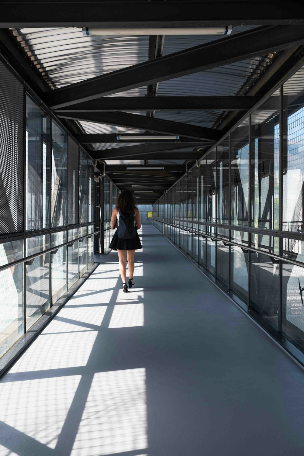 a person walking on a bridge