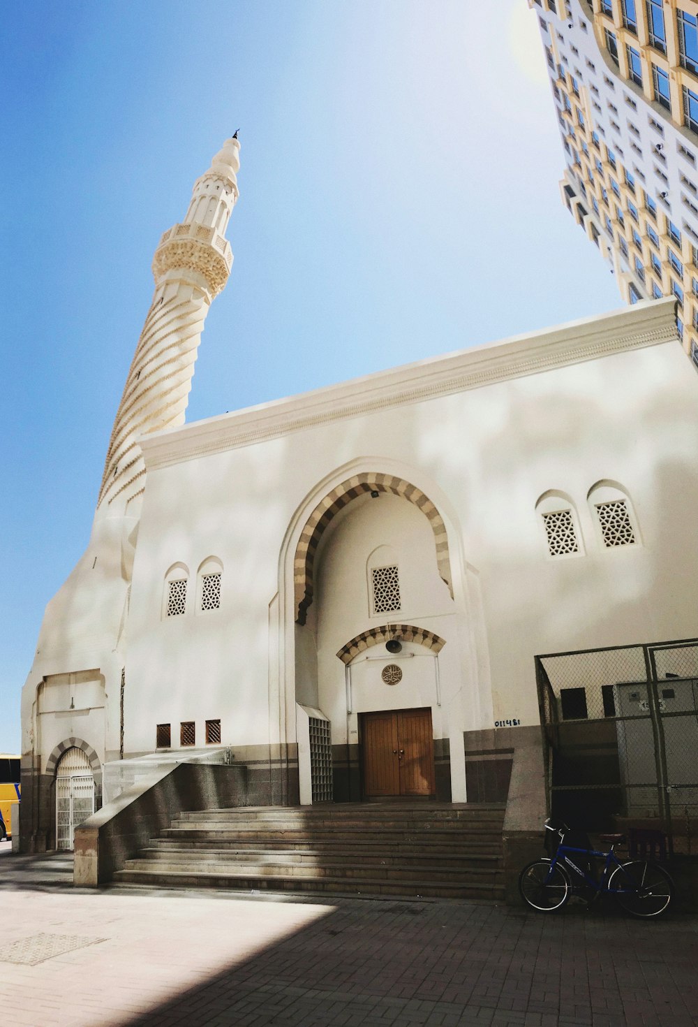 a white building with a tower