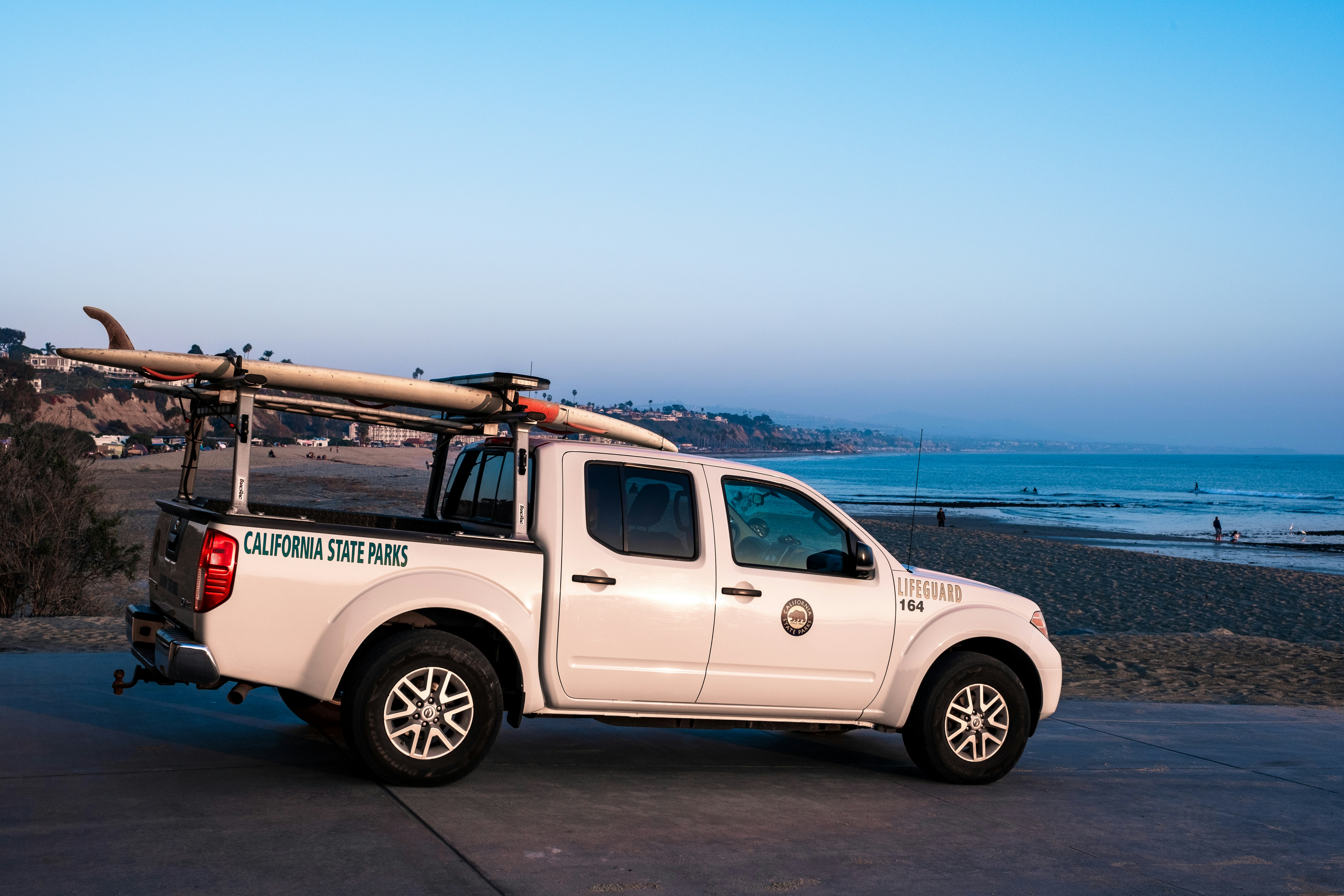 a truck with surfboards on top