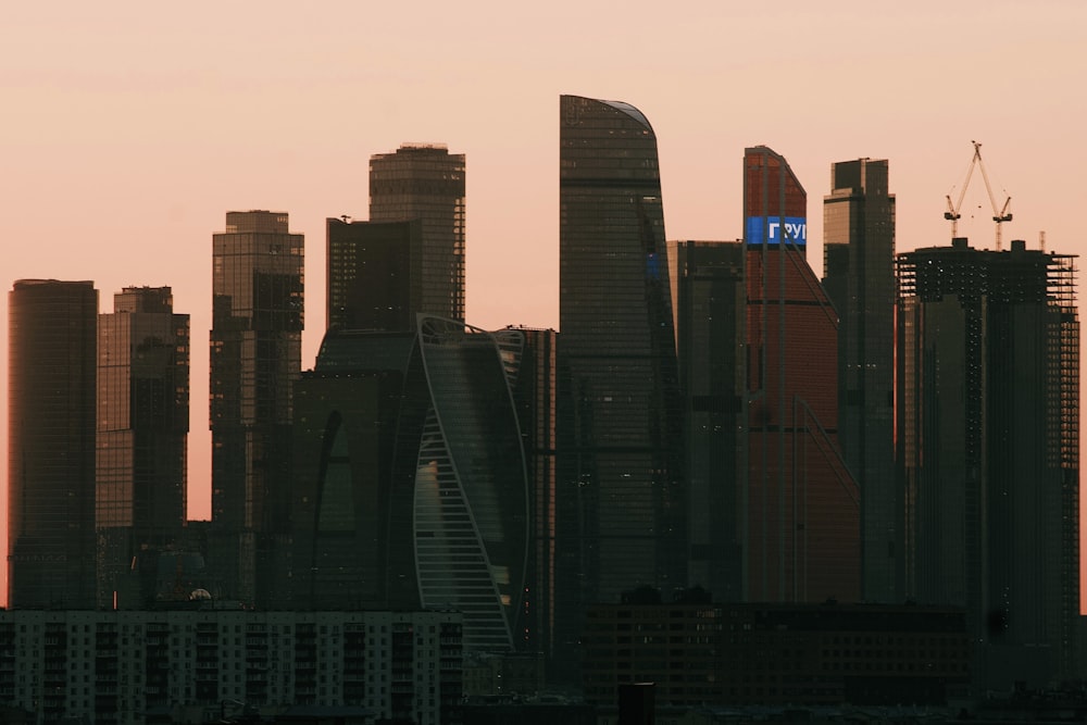 a city skyline at sunset