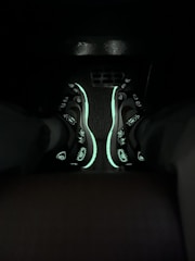 A stylish pair of moon-inspired sneakers showcasing iridescent accents.