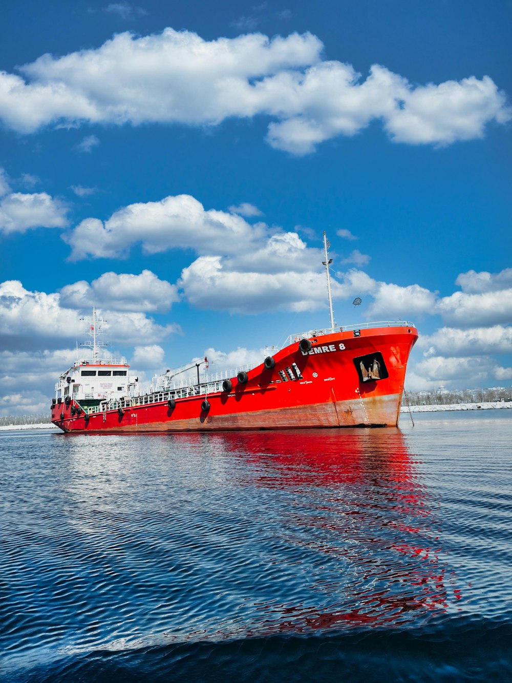 a large red and white boat