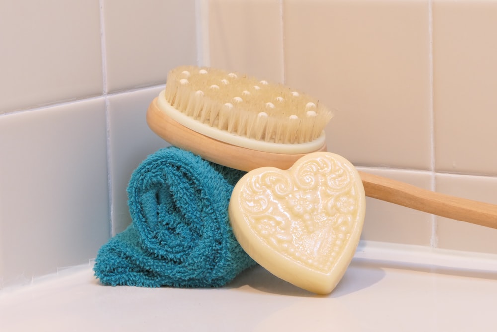 a couple of eggs with a towel on a shelf