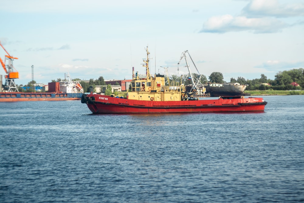 a large red and black boat