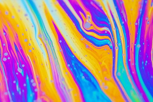 Album cover art featuring abstract purple waves and piano keys.