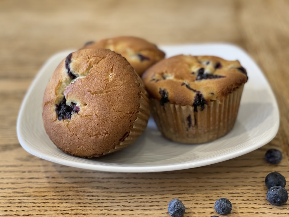 a plate of muffins