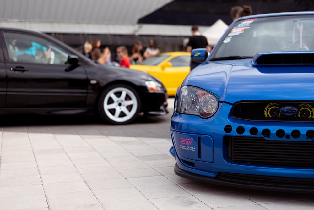 a group of cars parked in a parking lot