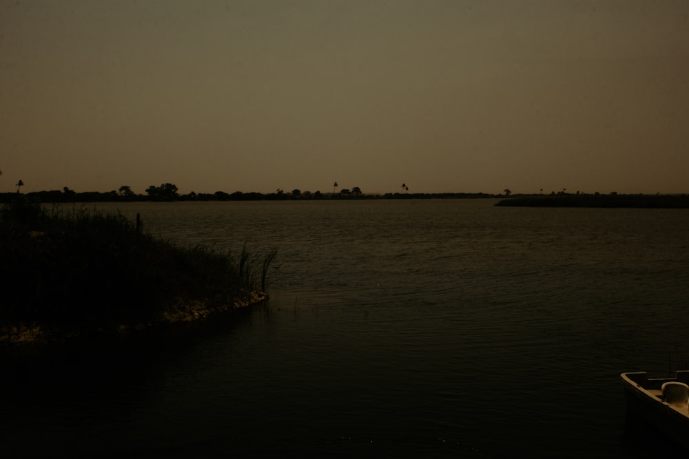 a body of water with land in the distance