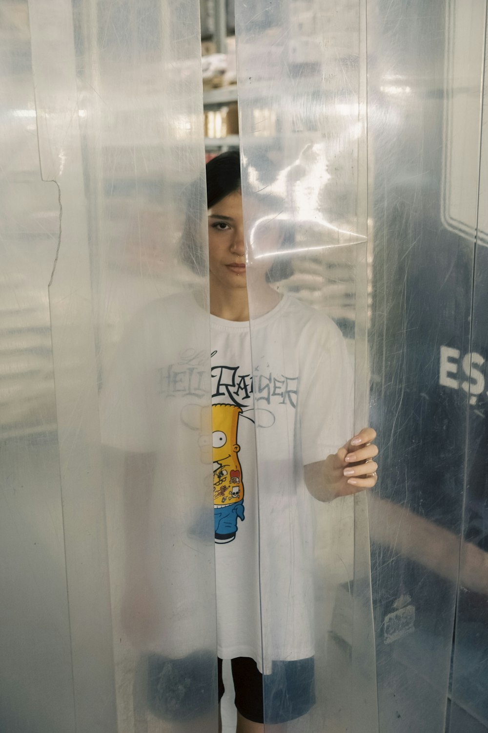 a person standing in a glass case